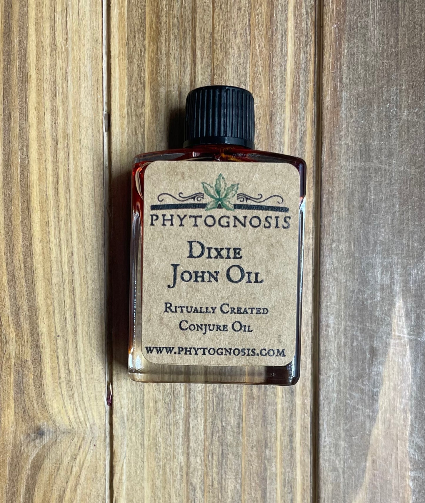 Dixie John Oil - A conjure oil of love, passion, and family