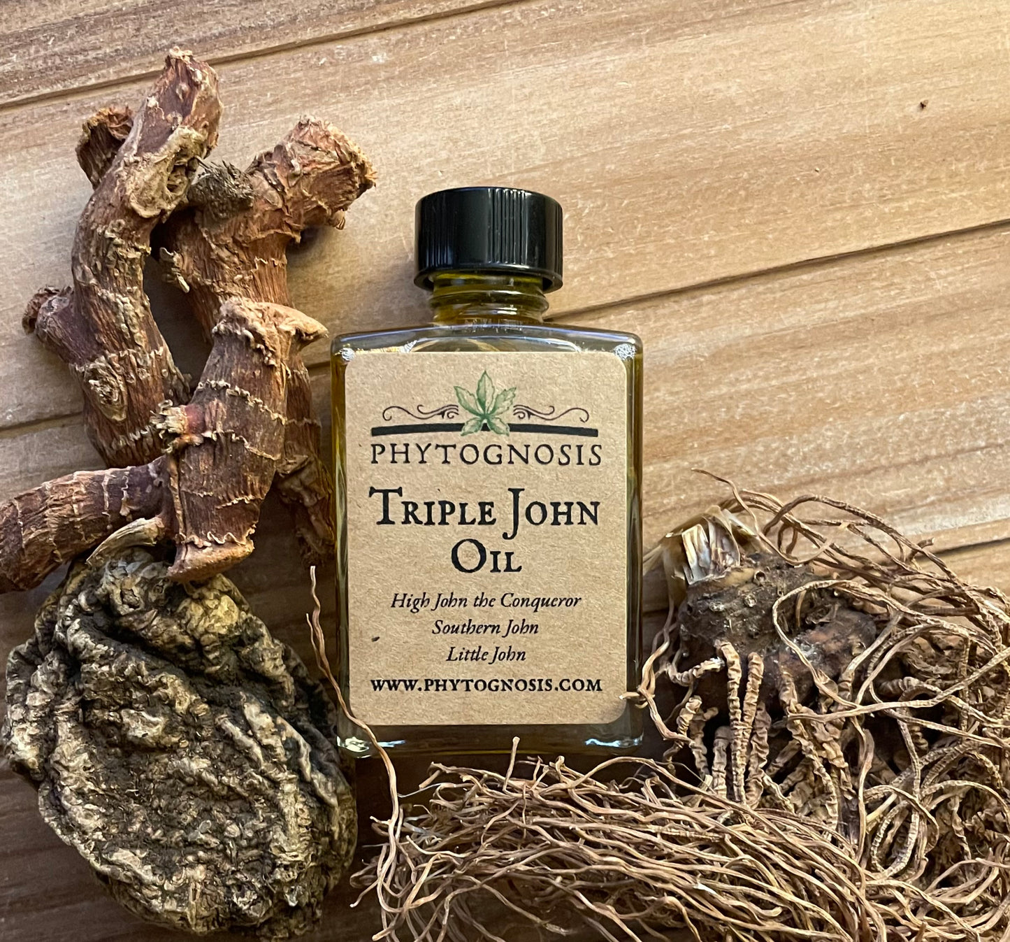 Triple John Oil 30mL clear glass bottle with black cap containing amber-colored hoodoo conjure oil made with High John the Conqueror, Little John to Chew, and Southern John roots