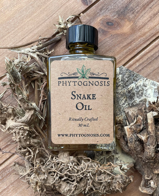 Snake Root Oil bottle - traditional hoodoo protection formula with four snake-themed roots in jojoba oil, 1 oz