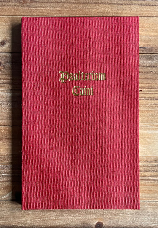 The Psalter of Cain hardcover edition, full red linen binding with gilt blocking and serpentine-embossed endsheets