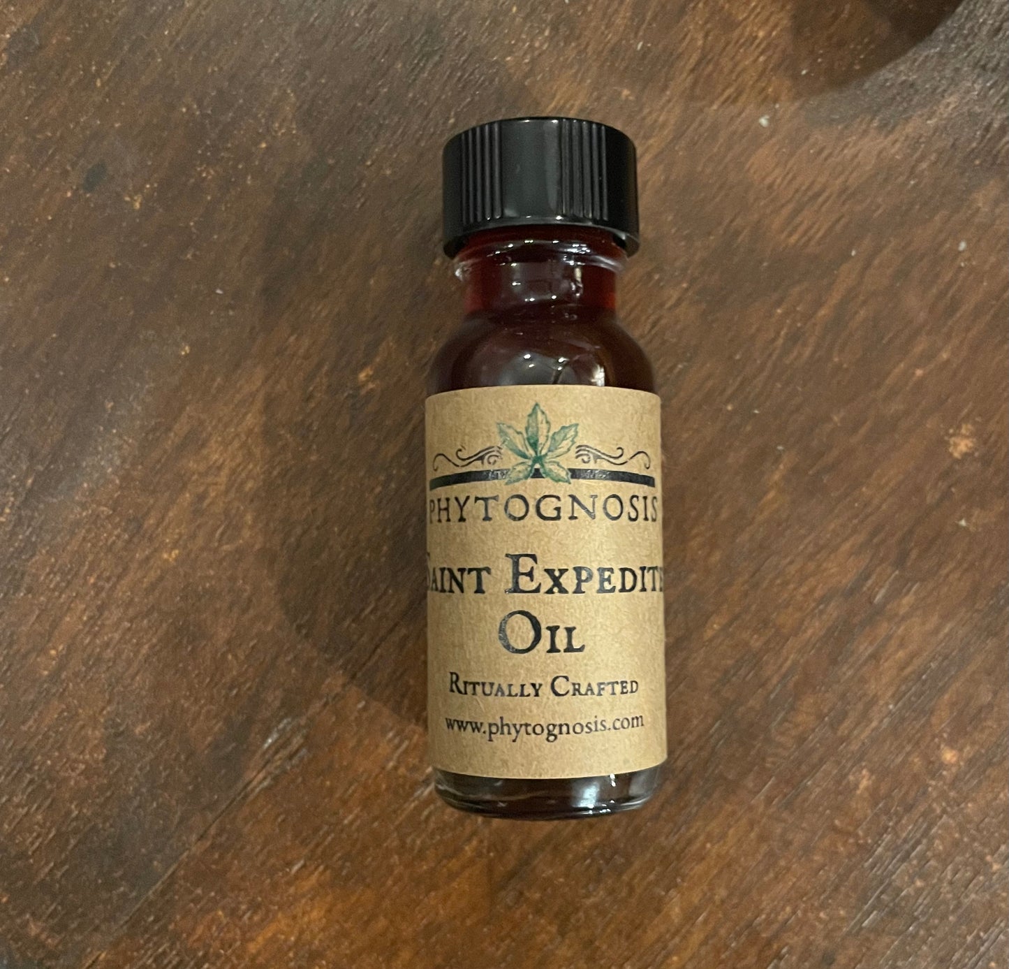 San Expedito conjure oil for fast results and urgent petitions, 15ml with genuine lodestone, sold as curio only