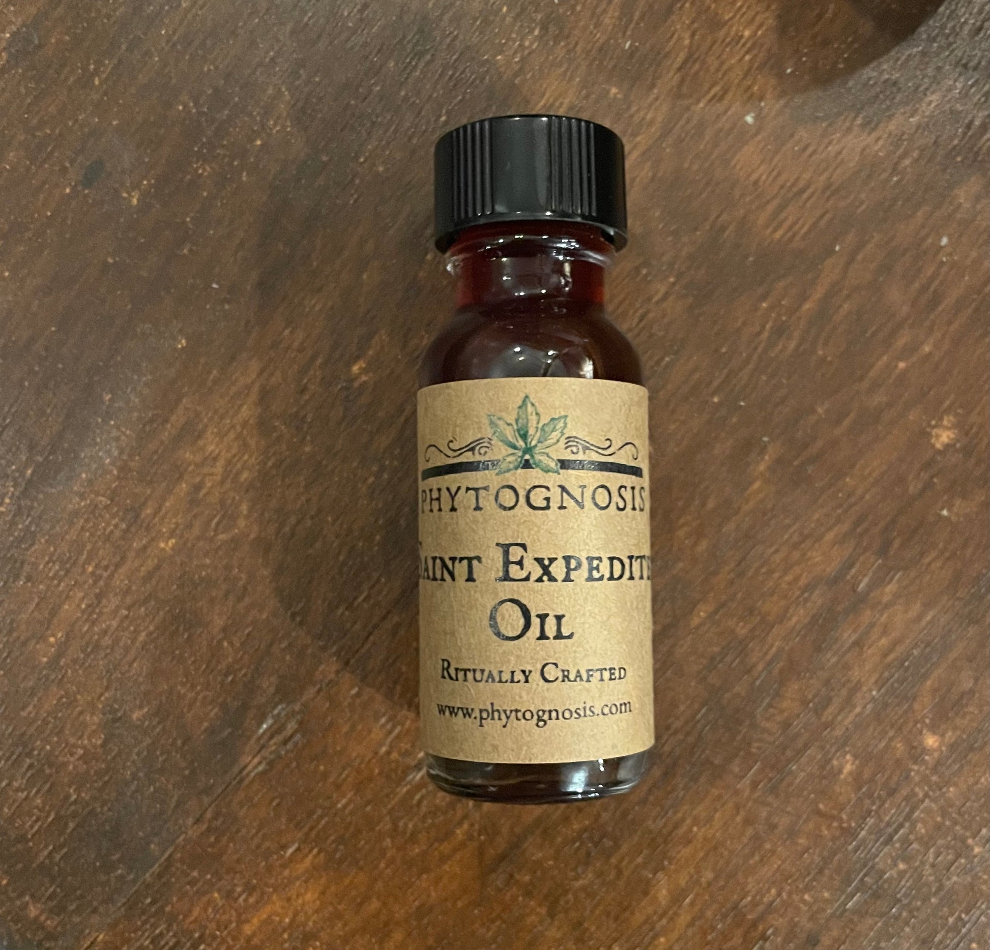 San Expedito conjure oil for fast results and urgent petitions, 15ml with genuine lodestone, sold as curio only