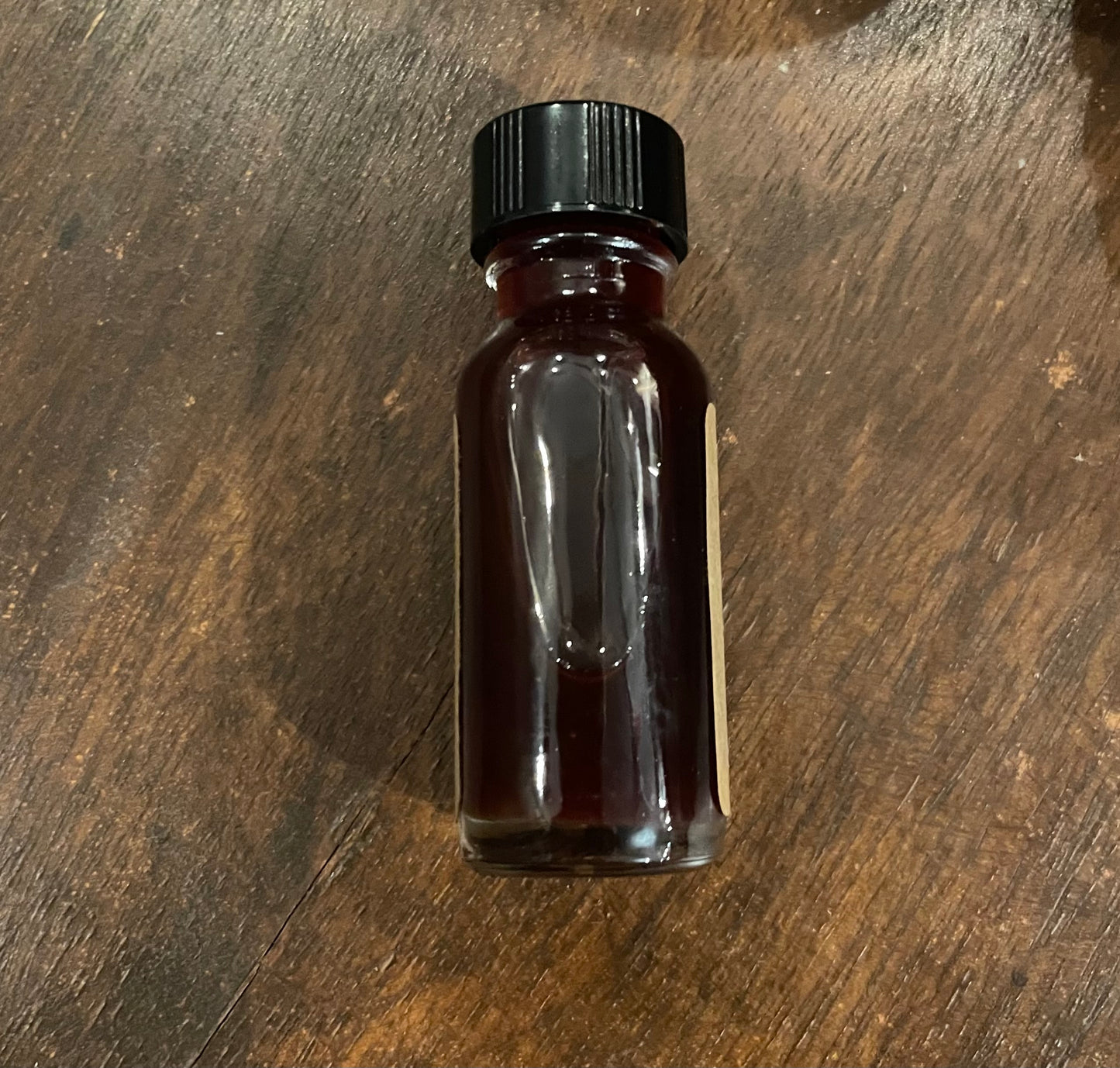 Saint Expedite conjure oil for fast results and urgent petitions, 15ml with genuine lodestone, sold as curio only