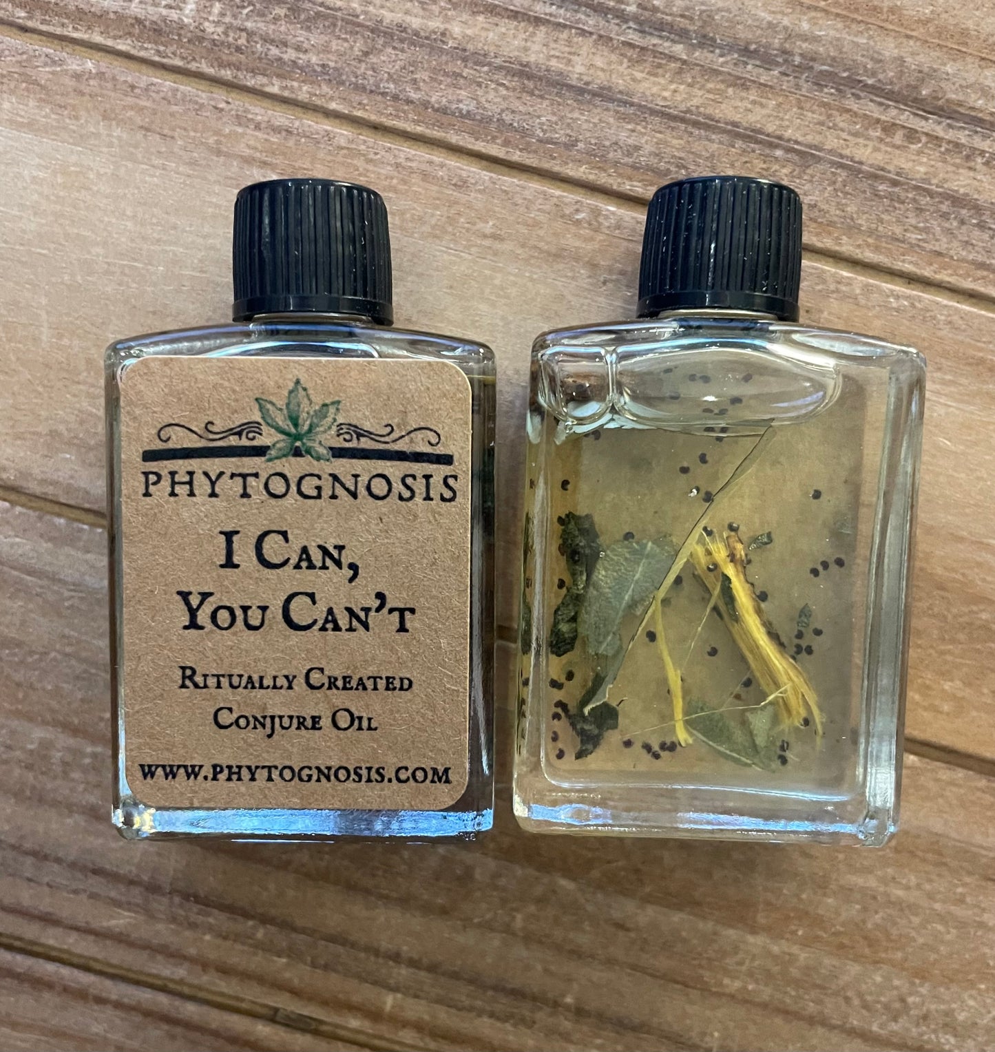 I Can You Can't dual-action conjure oil, 15ml bottle with visible herbs and roots in fractionated coconut oil base.