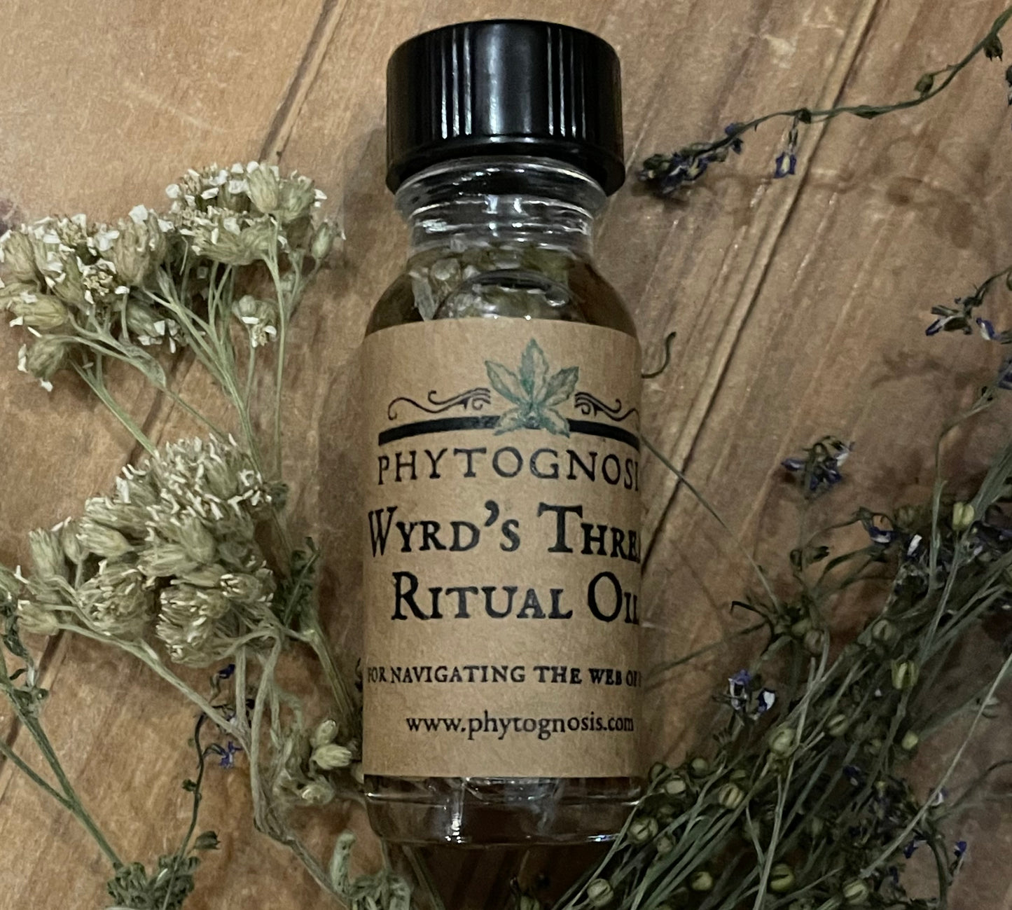 Wyrd’s Thread - A ritual oil for navigating the web of fate.